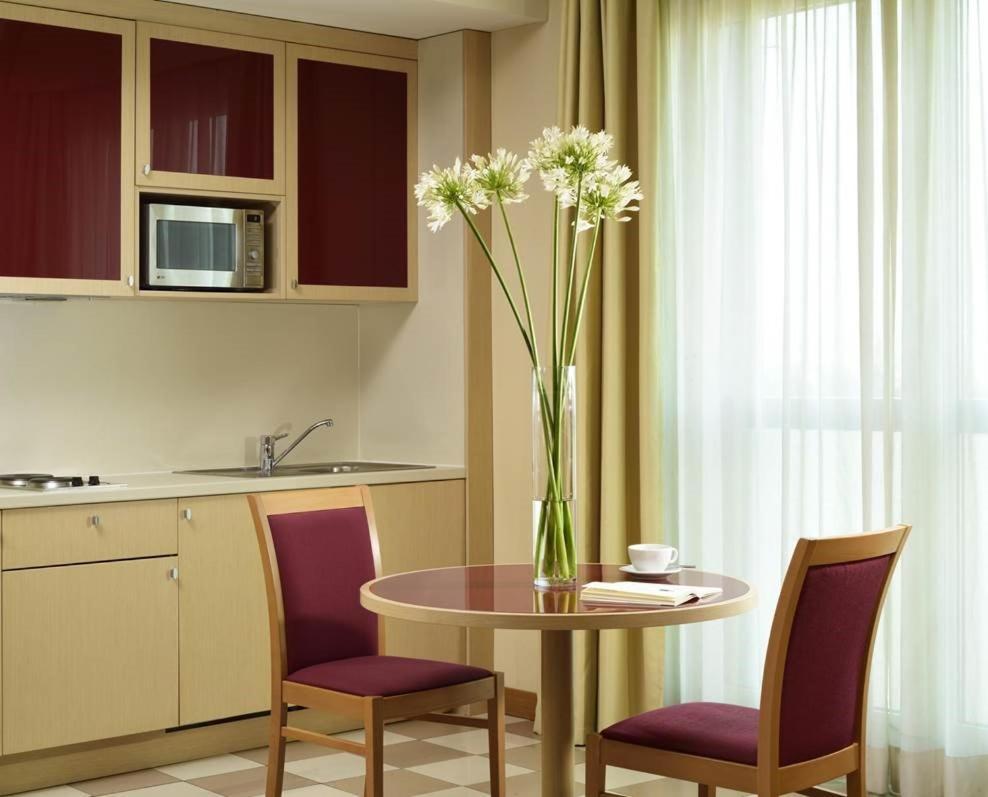 Una Hotels The One Milano Hotel & Residence Сан-Донато-Миланезе Экстерьер фото